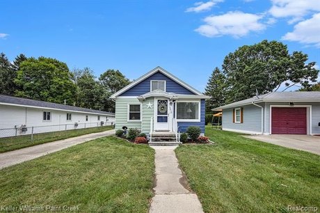 Welcome to 3210 Stone Street, a charming, move-in ready - Beach Home for sale in Port Huron, Michigan on Beachhouse.com