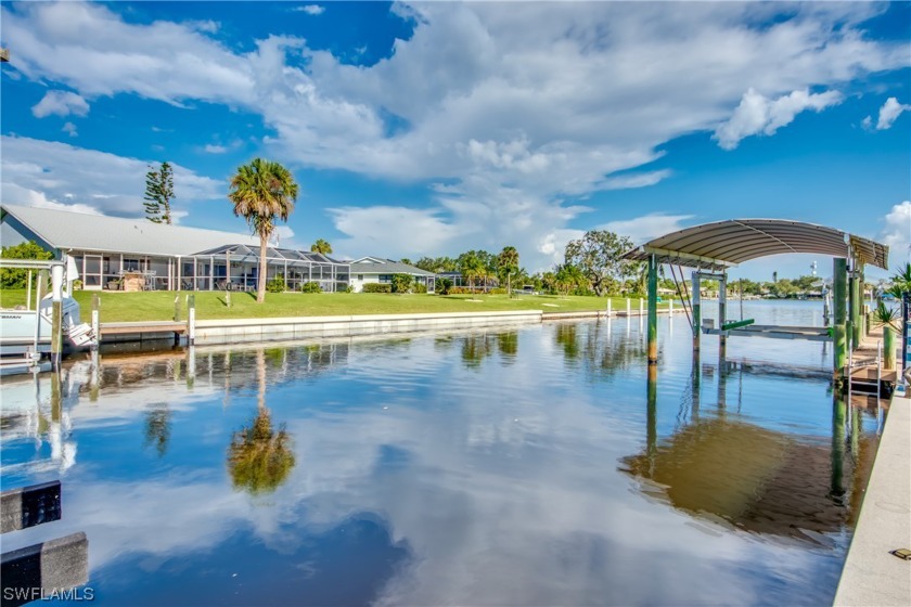 Welcome to your dream home! This single-family home boasts - Beach Home for sale in Port Charlotte, Florida on Beachhouse.com