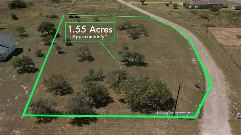 Beautiful partially fenced lot with scattered mature trees and - Beach Lot for sale in Rockport, Texas on Beachhouse.com