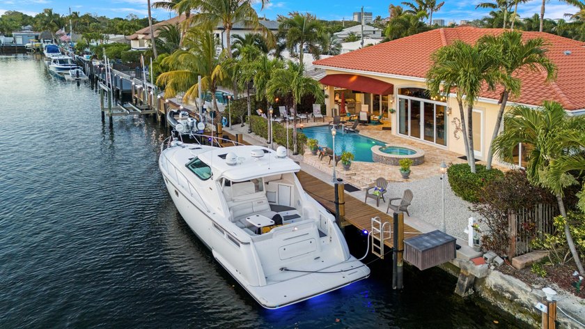 Set along a wide 100-foot canal, this stunning waterfront - Beach Home for sale in Pompano Beach, Florida on Beachhouse.com