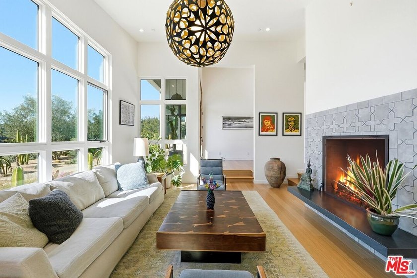 Set on approximately three private acres and nestled against the - Beach Home for sale in Malibu, California on Beachhouse.com