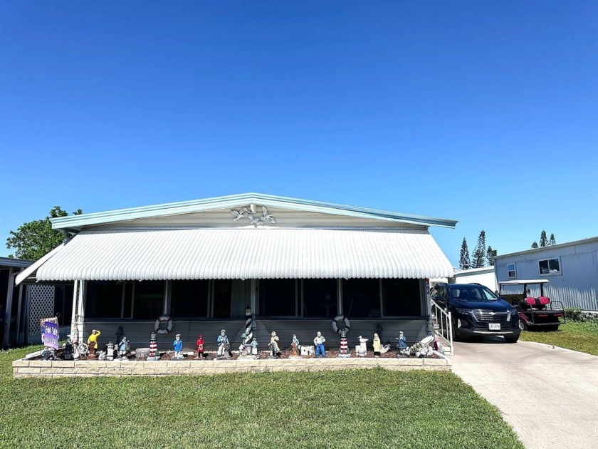 This meticulously maintained home is brimming with charm and - Beach Home for sale in Ellenton, Florida on Beachhouse.com