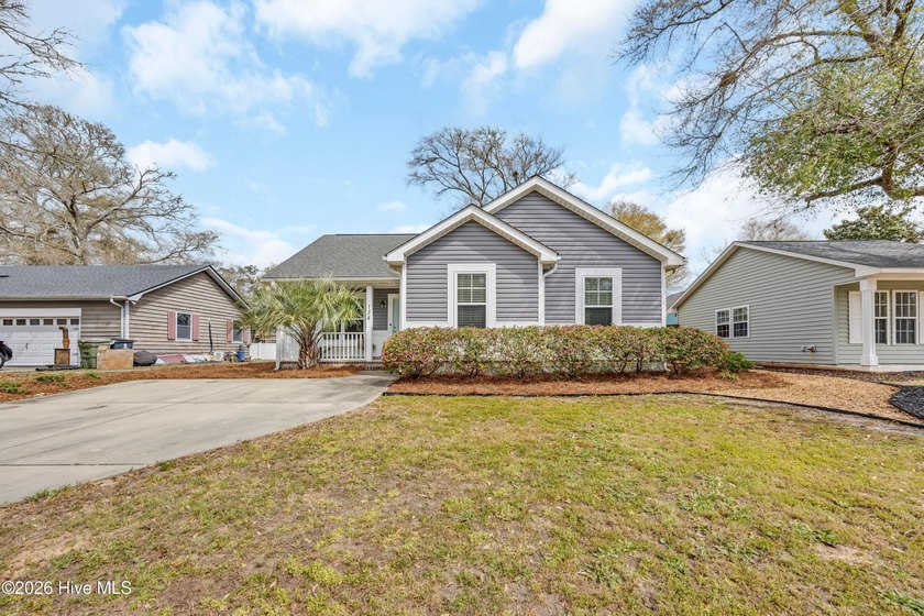 Experience quintessential beach living in this charming cottage - Beach Home for sale in Oak Island, North Carolina on Beachhouse.com