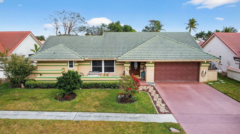 Welcome to your lakefront sanctuary in the heart of West Boynton - Beach Home for sale in Boynton Beach, Florida on Beachhouse.com