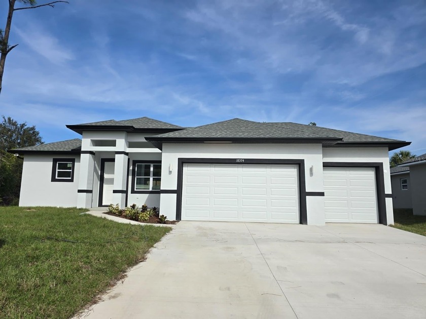 This elegant 4-bedroom, 2.5-bath home offers 1,695 sq. ft. of - Beach Home for sale in Port Charlotte, Florida on Beachhouse.com