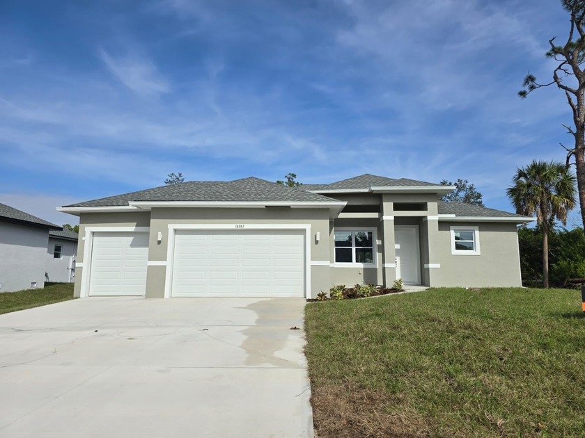 This elegant 4-bedroom, 2.5-bath home offers 1,695 sq. ft. of - Beach Home for sale in Port Charlotte, Florida on Beachhouse.com