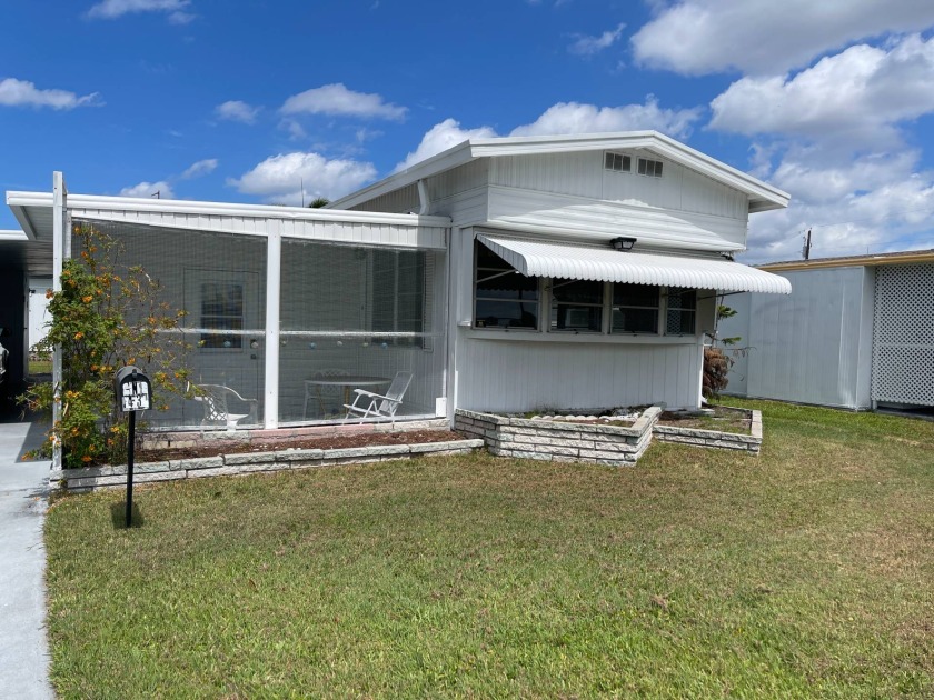 This 1967, 612 square foot under air, singlewide home, is set - Beach Home for sale in Bradenton, Florida on Beachhouse.com