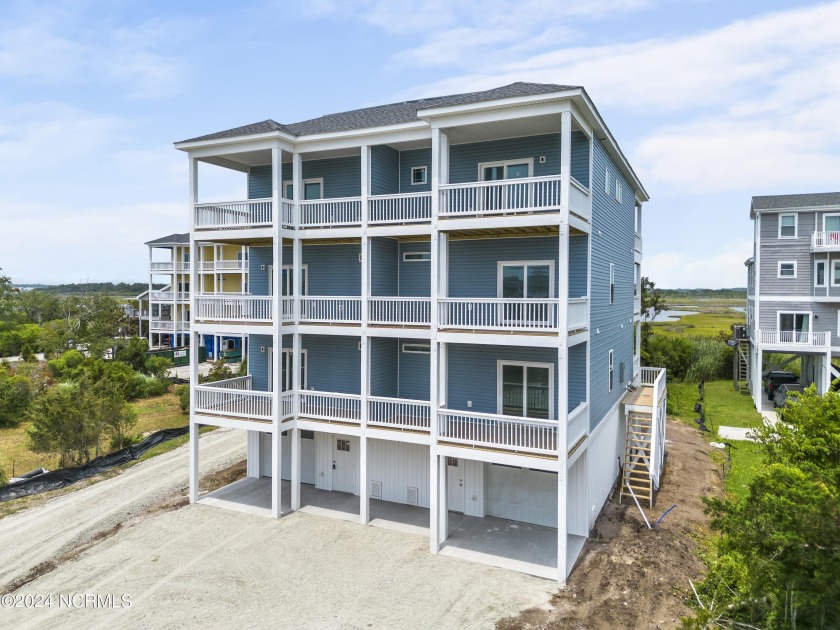 Introducing a prime investment opportunity with this new - Beach Townhome/Townhouse for sale in North Topsail Beach, North Carolina on Beachhouse.com