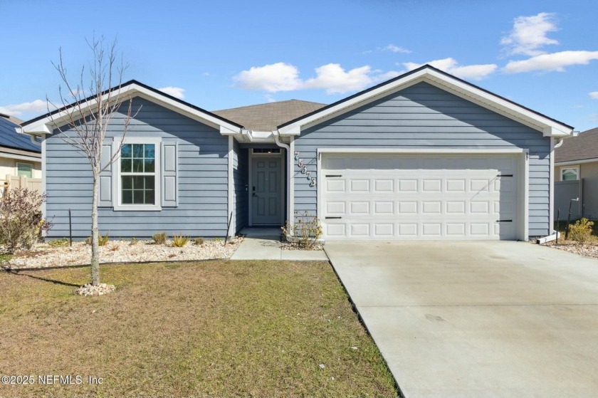 Welcome Home! Built in 2022, this 4 bed, 2 bath residence with a - Beach Home for sale in Yulee, Florida on Beachhouse.com