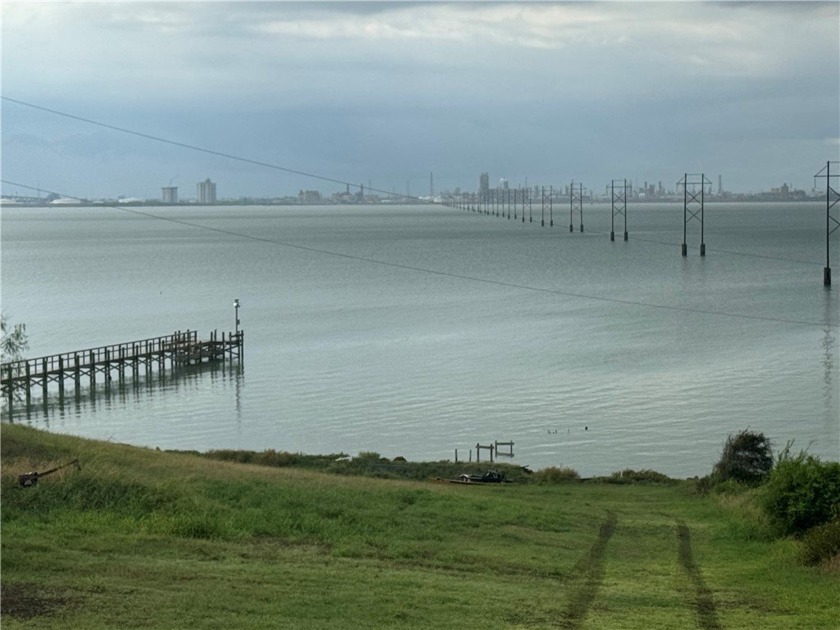 Wake to watercolor sunrises over Nueces Bay and wind down with - Beach Lot for sale in Taft, Texas on Beachhouse.com