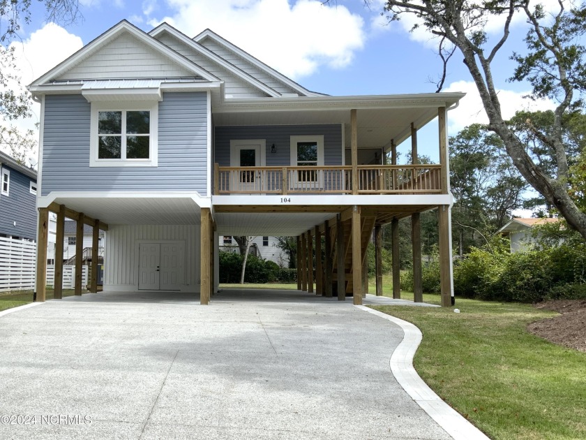 MUST SEA and almost complete! On the South side with water views - Beach Home for sale in Oak Island, North Carolina on Beachhouse.com