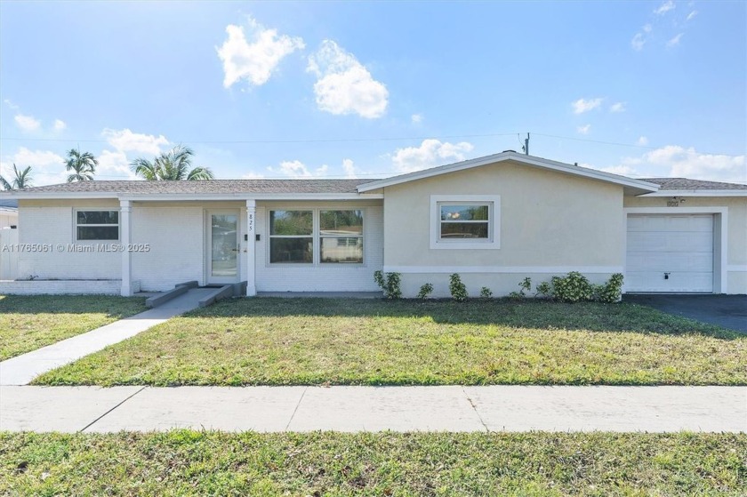 Charming 3-Bedroom Home in Desirable Melaleuca Gardens! 
 - Beach Home for sale in Dania, Florida on Beachhouse.com