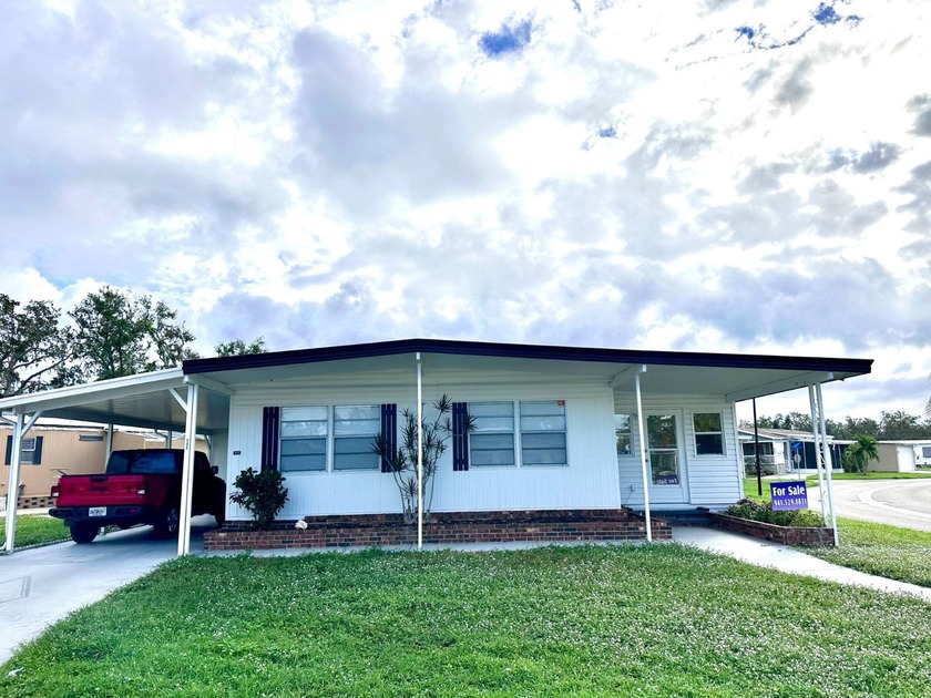 This stunning corner-lot home has been fully renovated and is - Beach Home for sale in Ellenton, Florida on Beachhouse.com