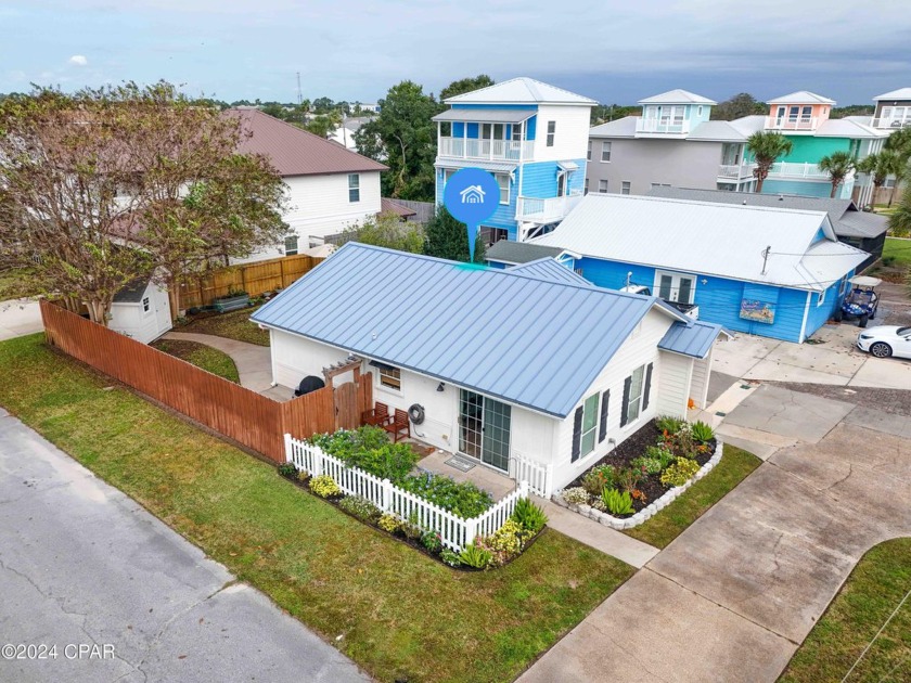 Welcome to your charming beachside cottage! This delightful - Beach Home for sale in Panama City Beach, Florida on Beachhouse.com