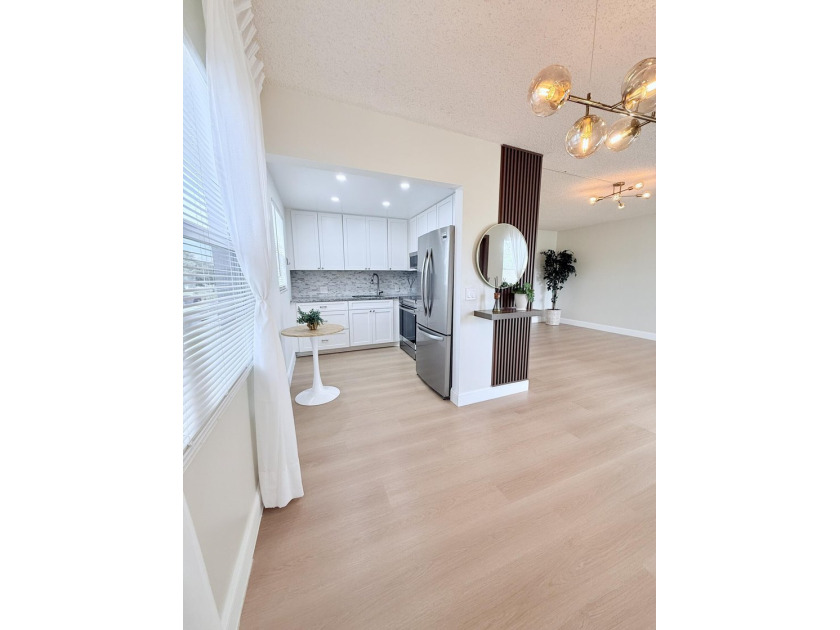 Beautifully renovated 2nd-floor corner unit in a prime location - Beach Condo for sale in Boca Raton, Florida on Beachhouse.com