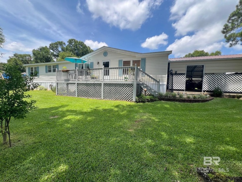 Welcome to this tranquil Coastal home with an open floor plan - Beach Home for sale in Lillian, Alabama on Beachhouse.com