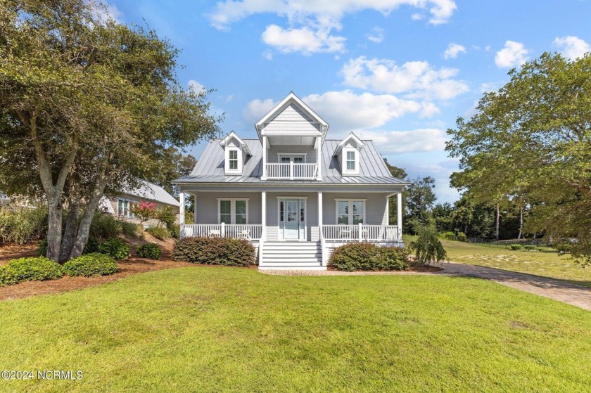 Elegant and easy coastal living awaits you in this lovely low - Beach Home for sale in Emerald Isle, North Carolina on Beachhouse.com