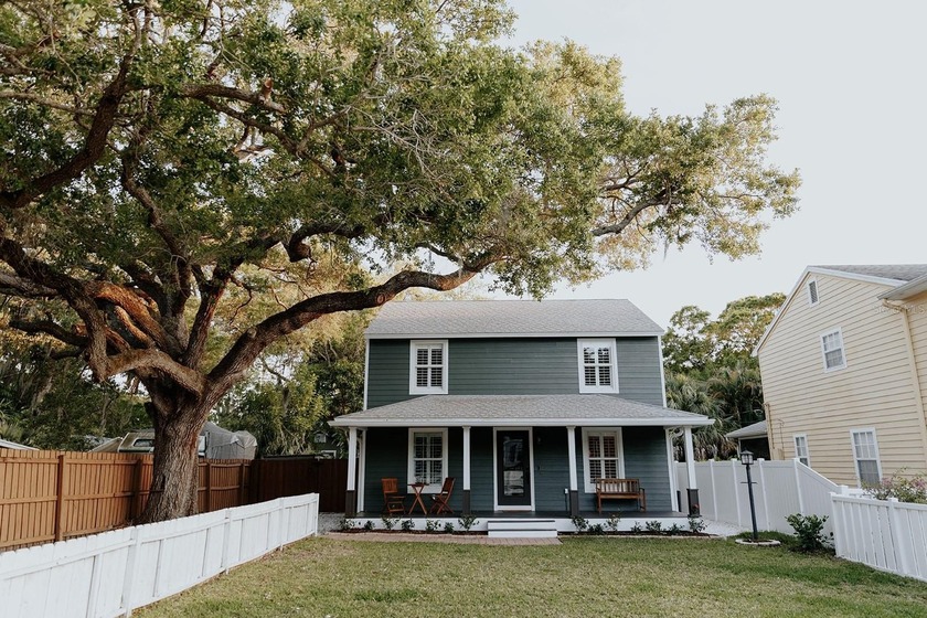 Beautifully modern, FURNISHED 4-bedroom, 2-bath home is nestled - Beach Home for sale in Sarasota, Florida on Beachhouse.com