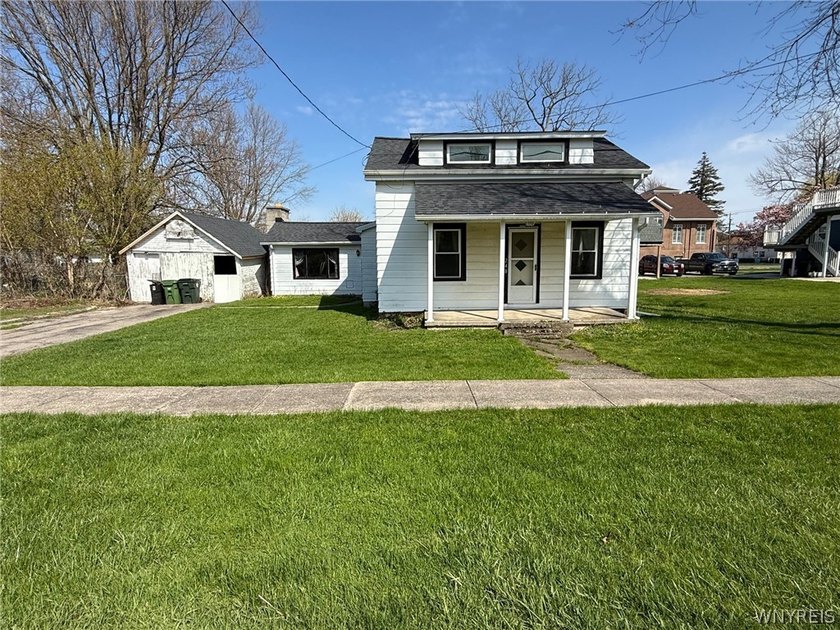 Charming three-bedroom, one-bath home located in the heart of - Beach Home for sale in Wilson, New York on Beachhouse.com