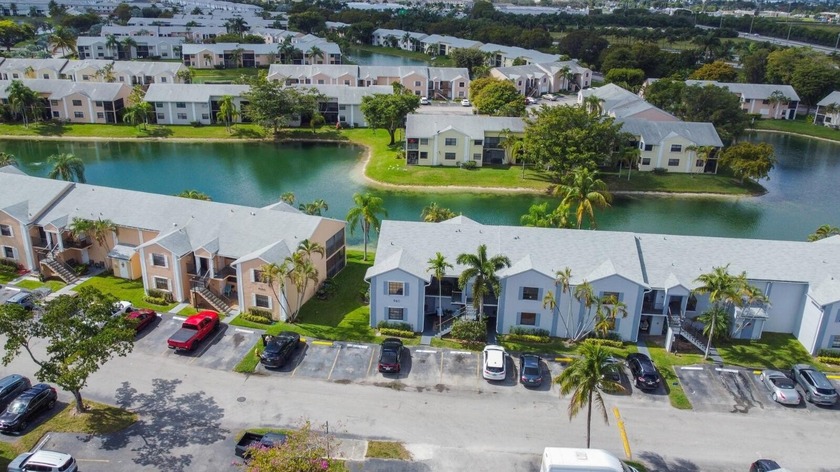 Discover serene lakefront living in this fully renovated - Beach Condo for sale in Homestead, Florida on Beachhouse.com