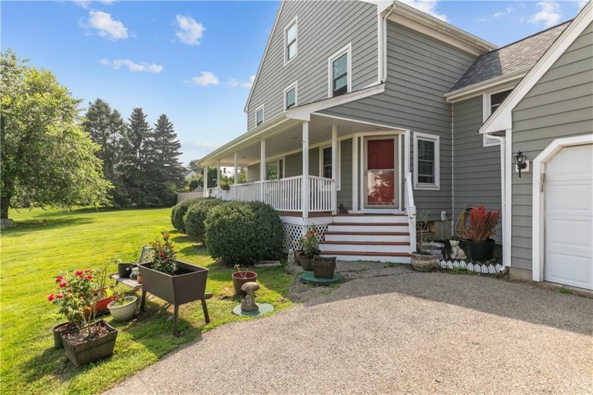 Welcome to 192 Spring Hill, this 4-bedroom, 2.5-bath colonial is - Beach Home for sale in Portsmouth, Rhode Island on Beachhouse.com