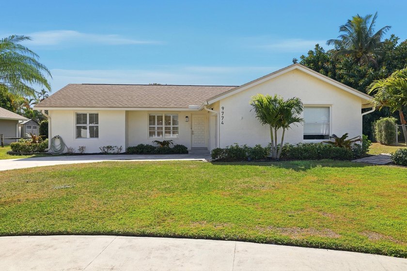 Tucked away on a peaceful cul-de-sac in West Boca, this - Beach Home for sale in Boca Raton, Florida on Beachhouse.com