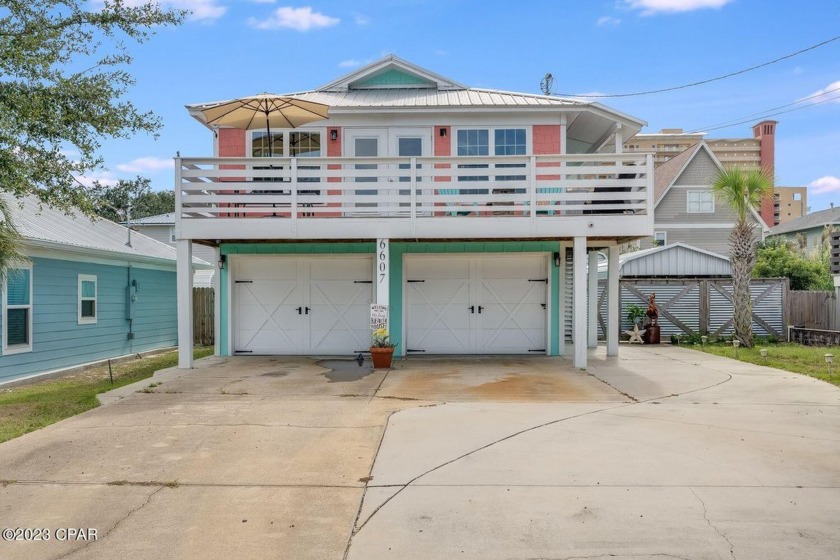 This vibrant and charming beach house is a true showstopper! - Beach Home for sale in Panama City, Florida on Beachhouse.com