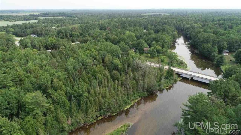 Located just a few minutes north of town on the Indian river - Beach Acreage for sale in Manistique, Michigan on Beachhouse.com