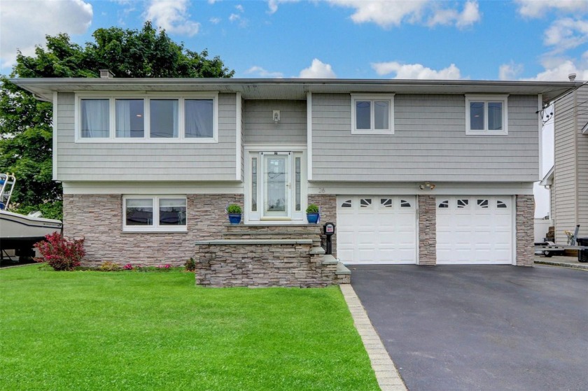 Welcome to 26 Bayview Avenue - A Luxurious, Move-In Ready Canal - Beach Home for sale in Babylon, New York on Beachhouse.com
