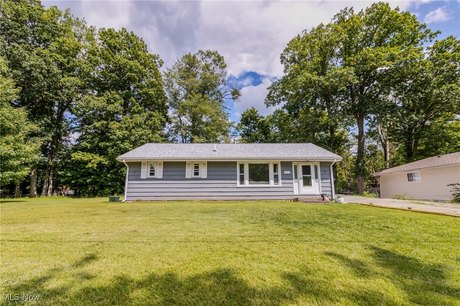 Nestled in the charming town of Madison, Ohio, this picturesque - Beach Home for sale in Madison, Ohio on Beachhouse.com