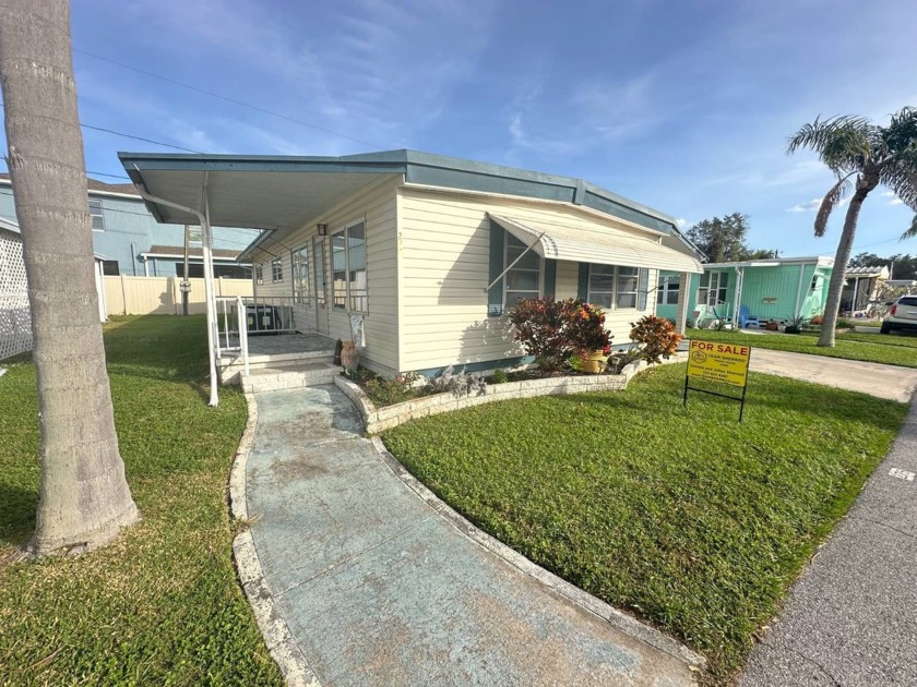 Discover this SUPER CLEAN 2-bedroom, 1.5-bath mobile home - Beach Home for sale in Clearwater, Florida on Beachhouse.com