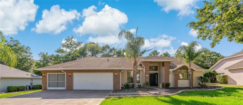 This Gorgeous POOL Home located in the Golf Community of Sugar - Beach Home for sale in Homosassa, Florida on Beachhouse.com