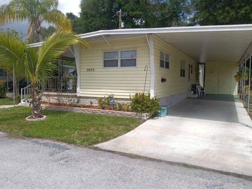 Welcome to your new retreat in the premier 55+ community of - Beach Home for sale in Clearwater, Florida on Beachhouse.com