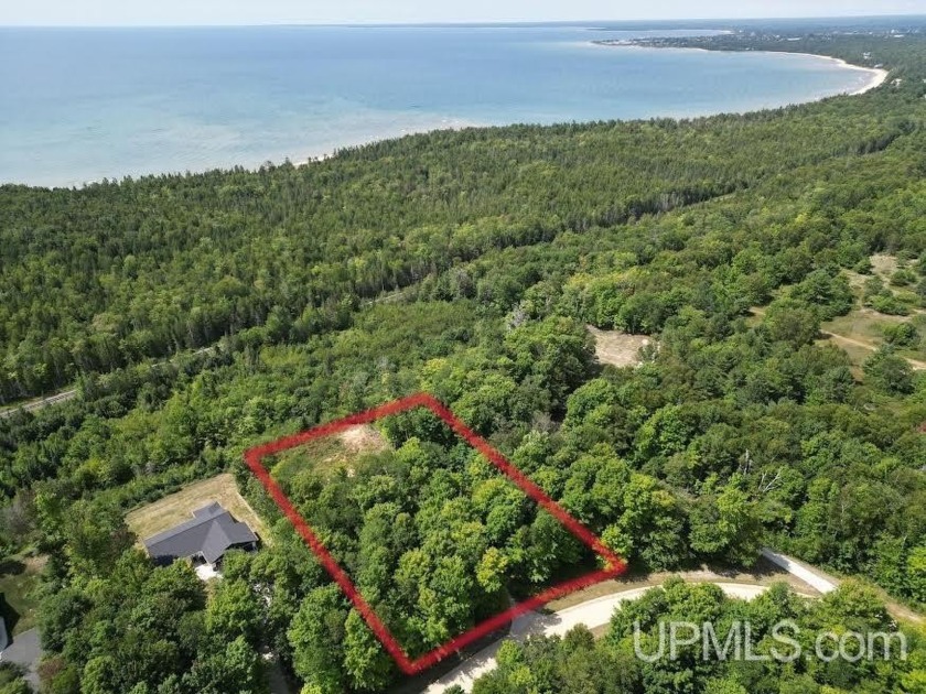 This premium building site offers an unparalleled opportunity to - Beach Lot for sale in Manistique, Michigan on Beachhouse.com