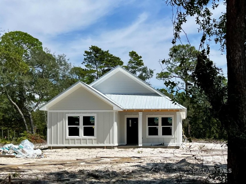 Brand-new construction situated on a peaceful half-acre wooded - Beach Home for sale in Gulf Shores, Alabama on Beachhouse.com