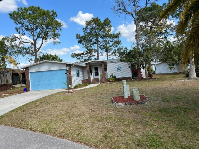 This lovely, manufactured home on leased land is in Pine Lakes - Beach Home for sale in North Fort Myers, Florida on Beachhouse.com