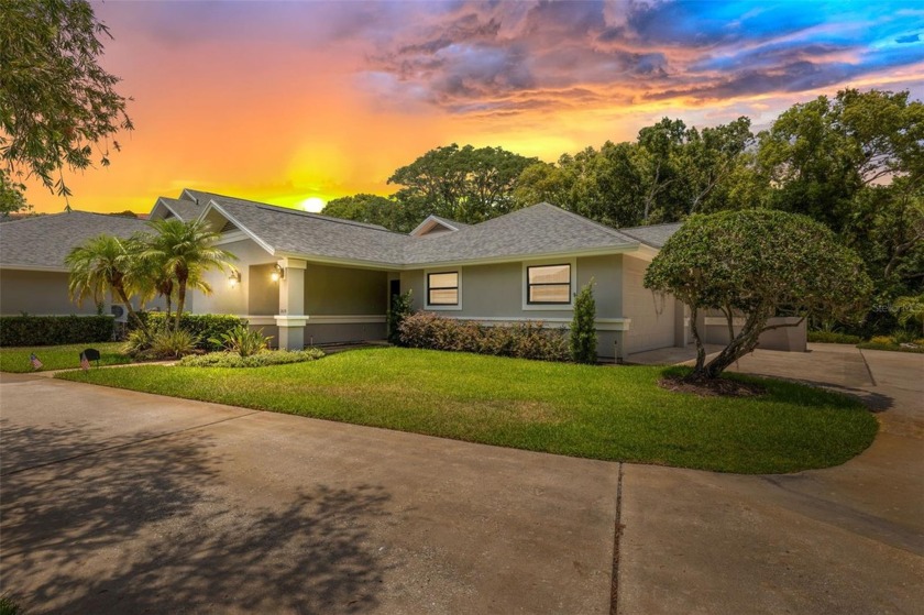 COUNTRY CLUB living at it's finest! This three bedroom villa in - Beach Home for sale in Tarpon Springs, Florida on Beachhouse.com