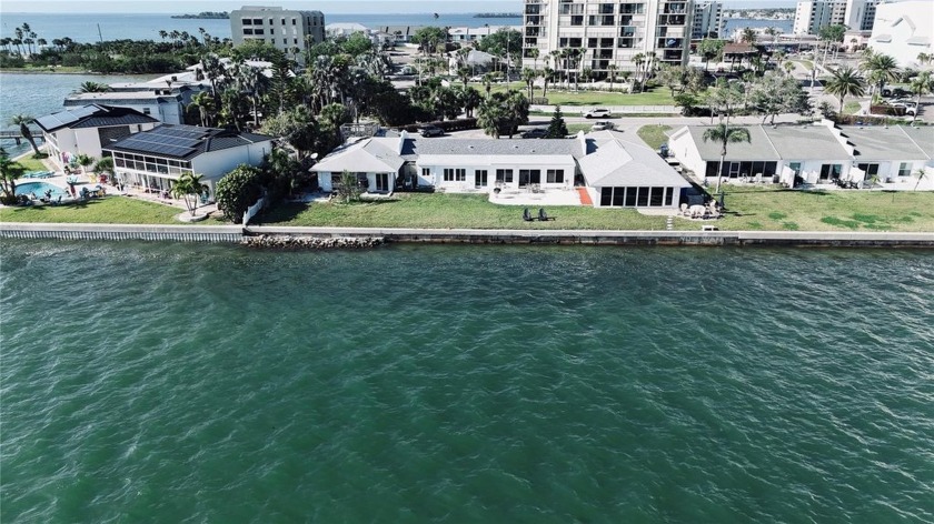 Under contract-accepting backup offers. Seize this rare - Beach Home for sale in Dunedin, Florida on Beachhouse.com