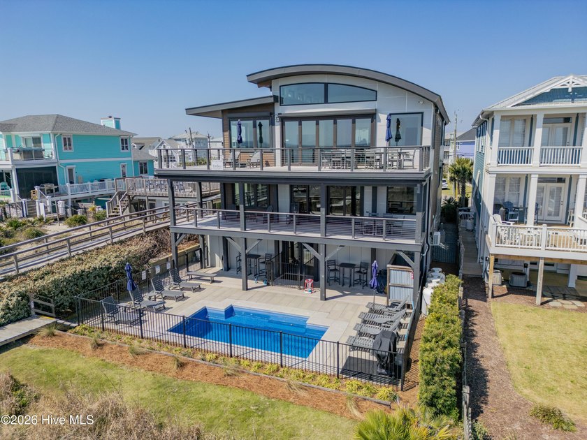 Positioned along one of the most private stretches of coastline - Beach Home for sale in Kure Beach, North Carolina on Beachhouse.com