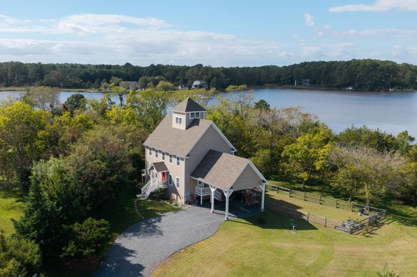 Tucked along Deep Creek just outside Onancock, this home - Beach Home for sale in Onancock, Virginia on Beachhouse.com