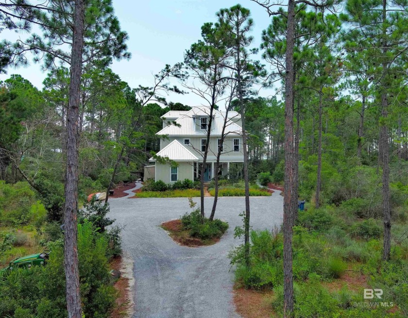 This nearly-new custom home is built on the shores of Little - Beach Home for sale in Gulf Shores, Alabama on Beachhouse.com