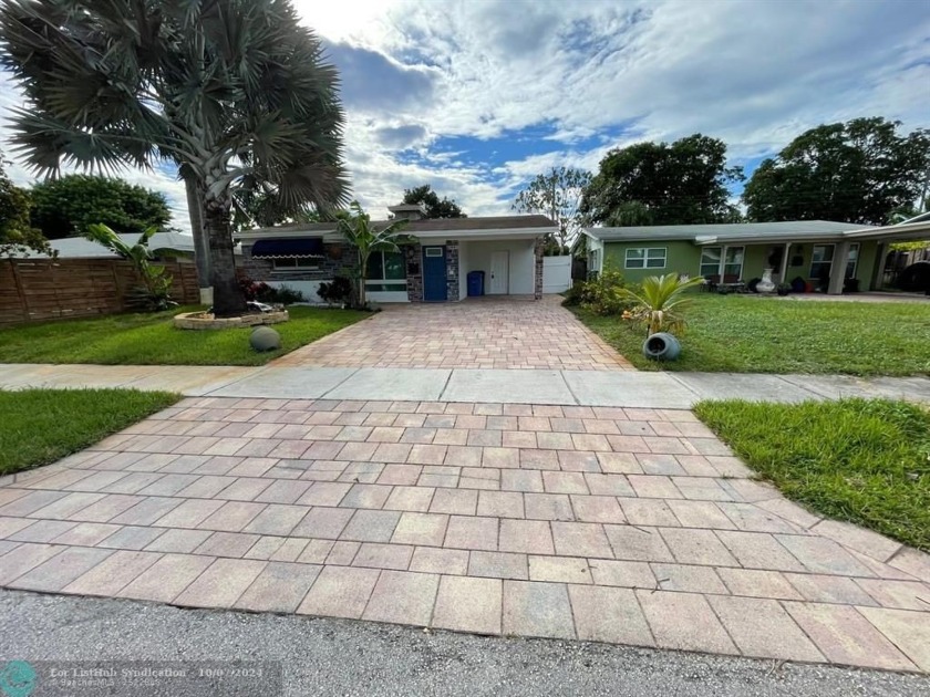 Beautifully renovated 3/2 house + Carport. Once used as an - Beach Home for sale in Oakland Park, Florida on Beachhouse.com