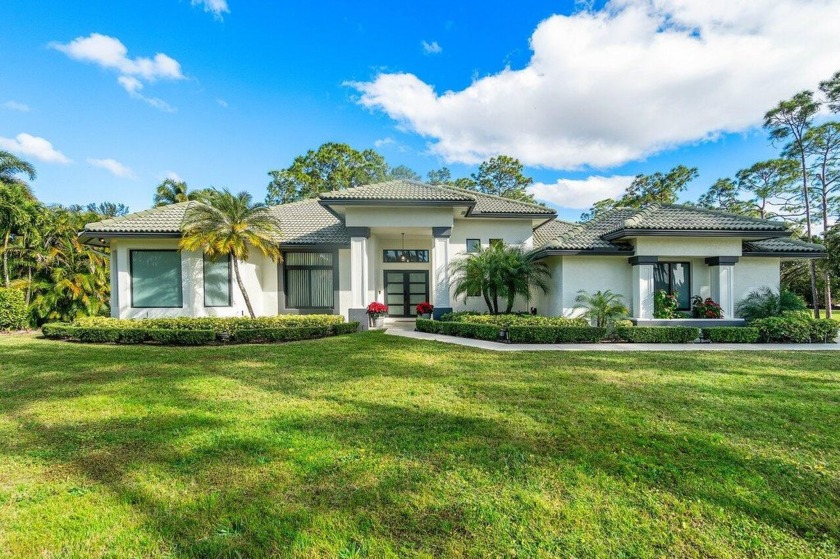 Stunning & Tranquil 5-Bedroom, 3-Bathroom Pool Home in Bay Hill - Beach Home for sale in West Palm Beach, Florida on Beachhouse.com