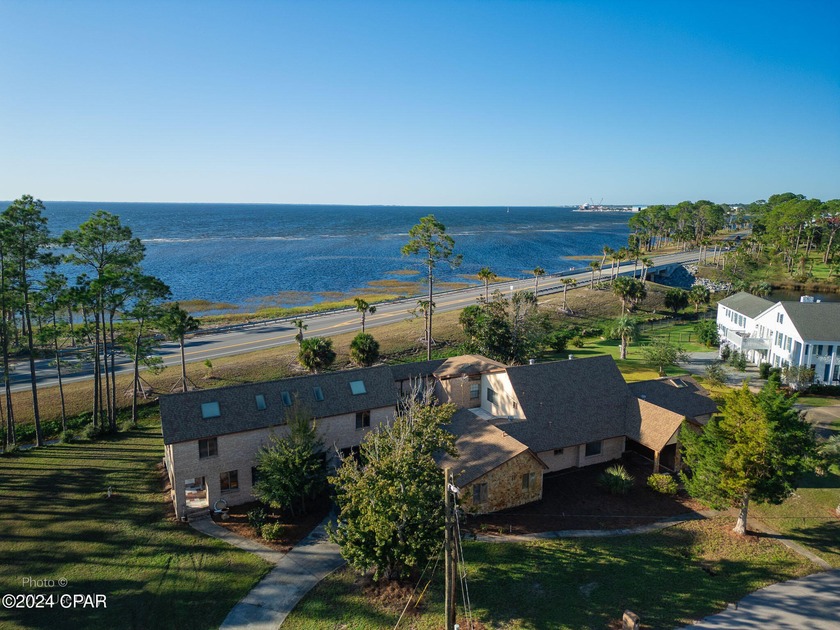 Positioned on a rare double lot with expansive water views and - Beach Home for sale in Port St Joe, Florida on Beachhouse.com