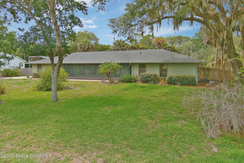 What an opportunity to own a treasure of a home on an acre in - Beach Home for sale in Merritt Island, Florida on Beachhouse.com