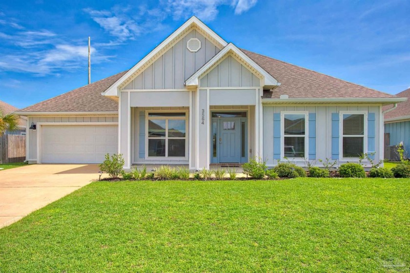Discover this meticulously upgraded 6-bedroom, 3-bathroom - Beach Home for sale in Gulf Breeze, Florida on Beachhouse.com