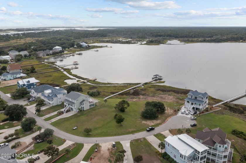 Nestled along the serene shores of Little River Inlet in Sneads - Beach Lot for sale in Sneads Ferry, North Carolina on Beachhouse.com