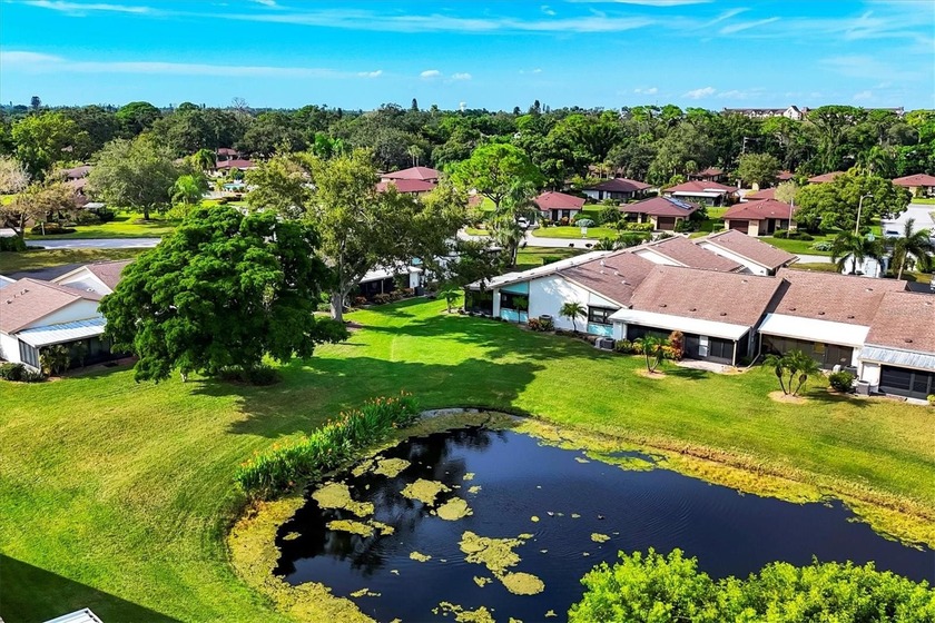 Welcome home to this beautifully updated end-unit villa offering - Beach Home for sale in Bradenton, Florida on Beachhouse.com