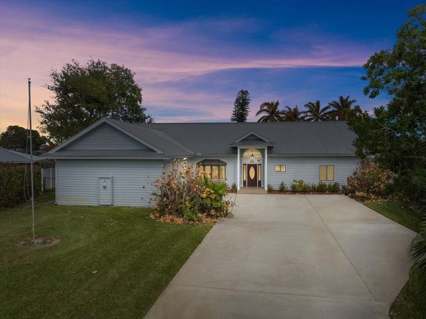 WELCOME TO YOUR VERO SHORES WATERFRONT HOME ON A RARE HALF-ACRE - Beach Home for sale in Vero Beach, Florida on Beachhouse.com