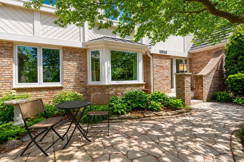 Welcome home to a refined open-concept sanctuary where spacious - Beach Home for sale in Mequon, Wisconsin on Beachhouse.com